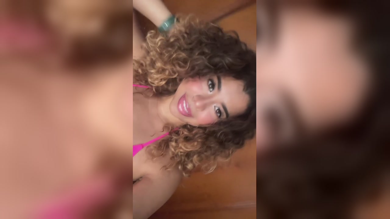 Curly Brunette Teases In Pink Bikini On Webcam