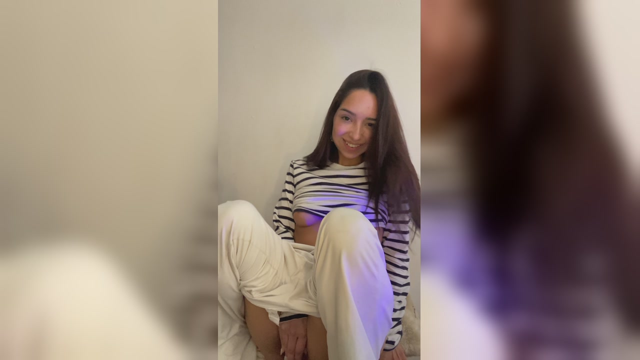 Brunette Teases Wet Pussy In Striped Top On Webcam
