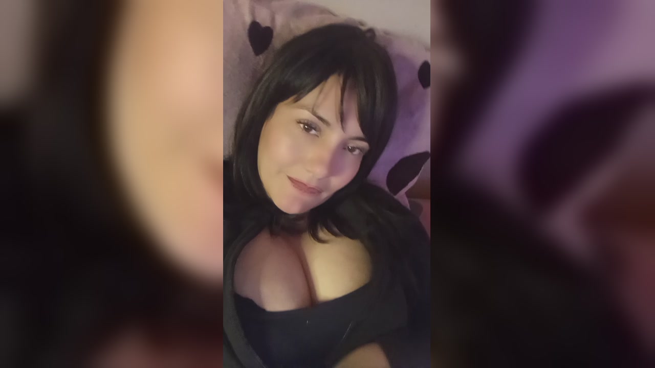 Brunette Teases Her Big Tits In Black Lingerie On Webcam