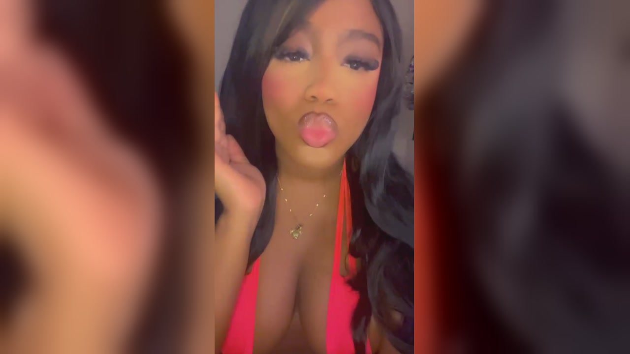Curvy Ebony Babe Teases Her Huge Tits In Red Thong