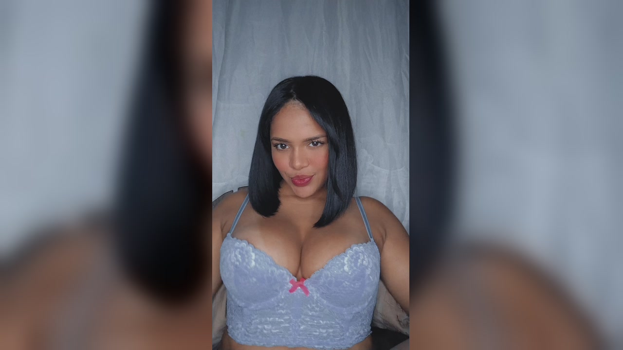 Curvy Brunette Teases Her Big Tits In Lacy Bra
