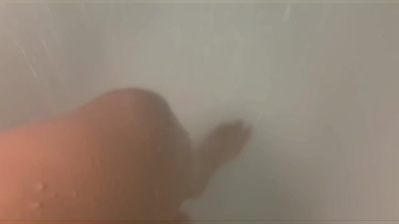 Curvy Brunette Teases Her Wet Pussy In The Shower