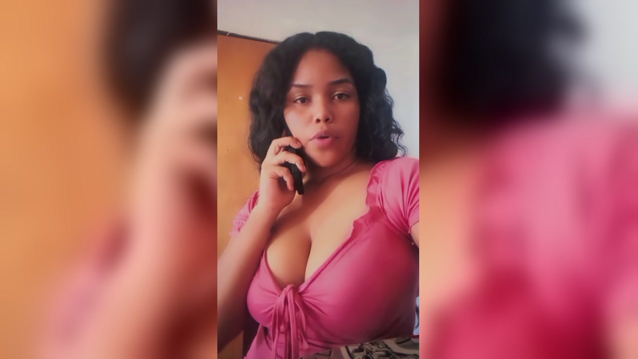 Curvy Brunette Teases Big Tits On Webcam In Pink Top